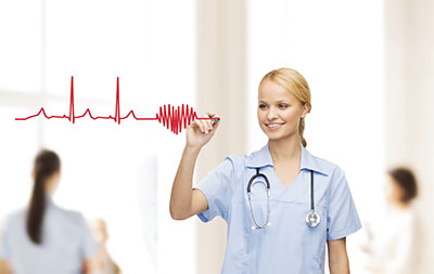 smiling doctor or nurse drawing electrocardiogram